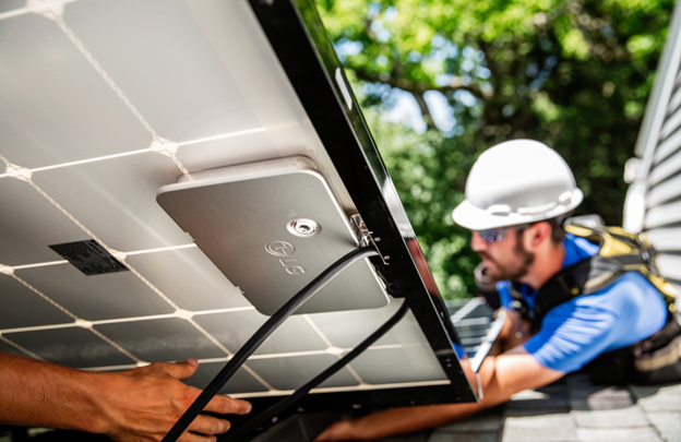 Image of the author's solar panels being installed on his roof