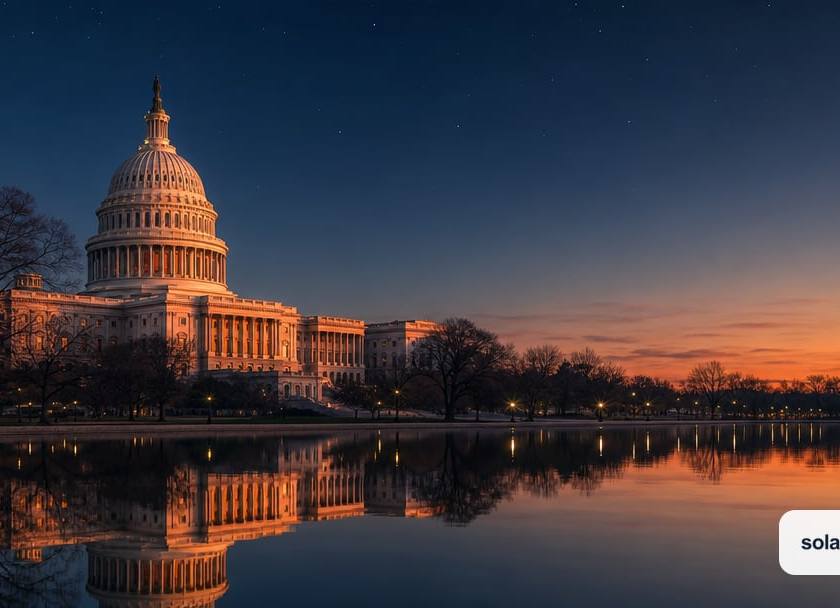 U.S. Capitol Building behind the reflecting pool at dusk.